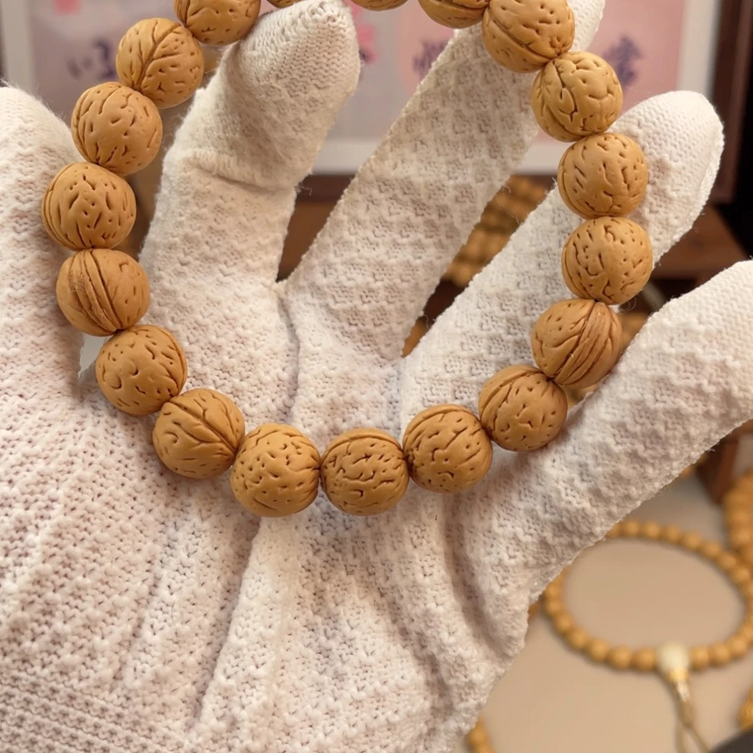 吊坠桃核桃核手持东北锦绣