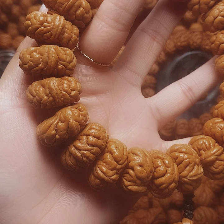 徐****吊坠文玩核桃龙纹桃核手串