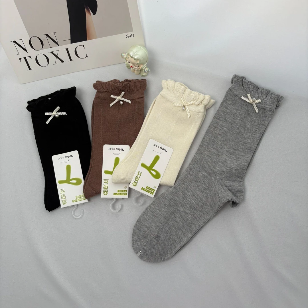 222女士桑蚕丝珍珠蝴蝶结饰品袜黑白中筒袜休闲百搭