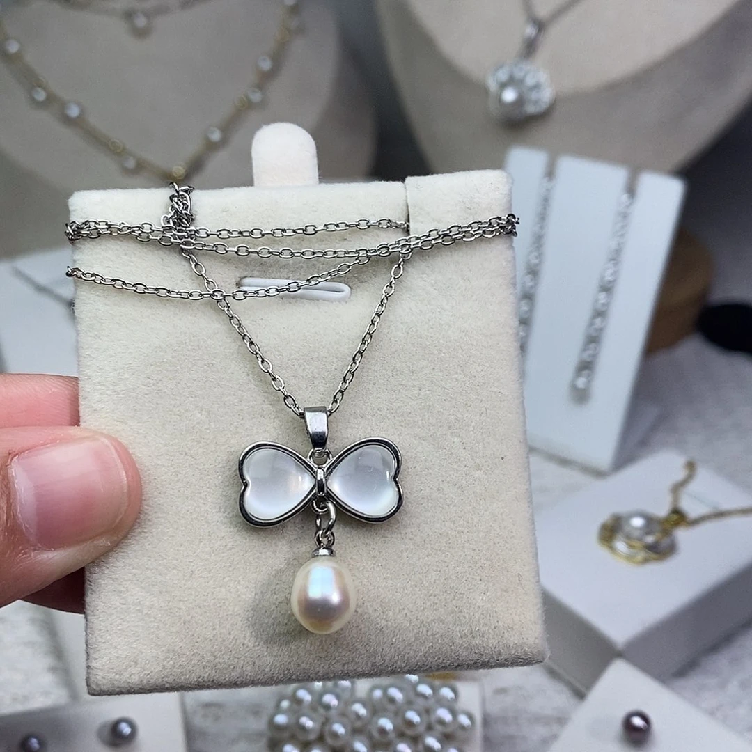 淡水珍珠银S925镶嵌耳饰