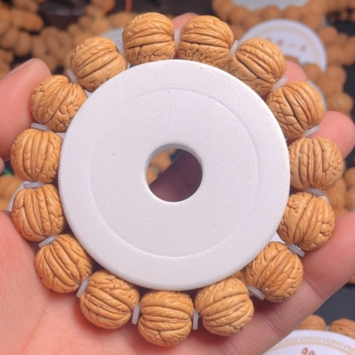 桃核吊坠高*人盘锦肌肉