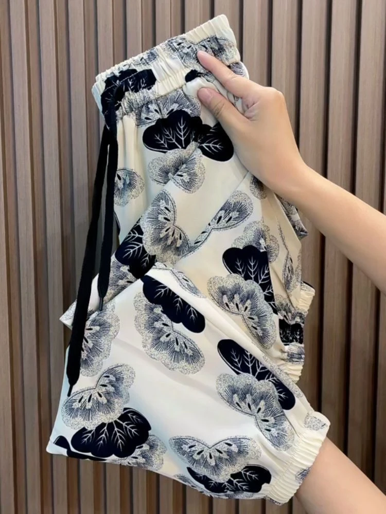 大码300斤遮肉灯笼裤夏季薄款女碎花复古时尚高腰气质束脚裤胖mm