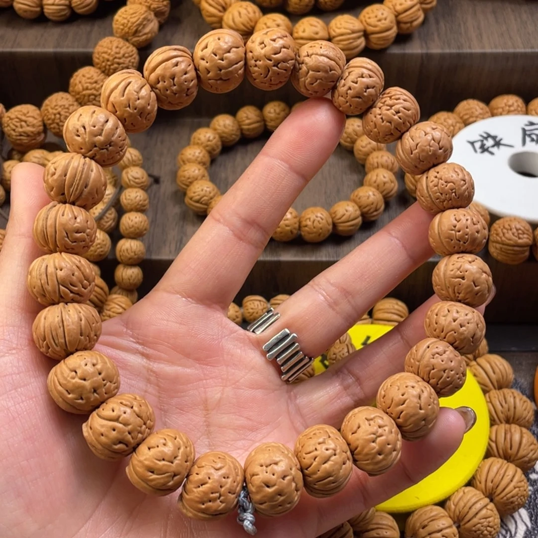 桃核手串纽扣手持