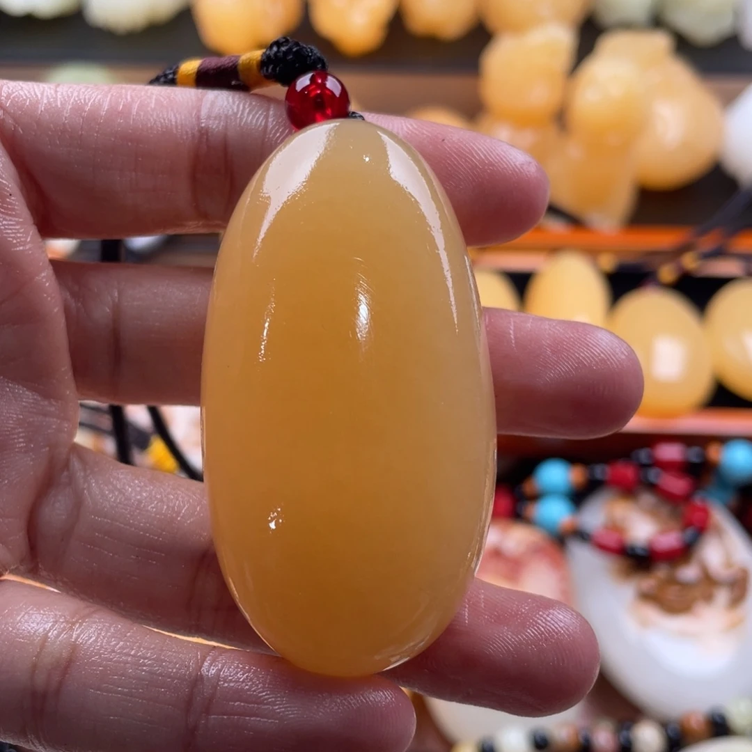 N***e石材天然古青石手把件