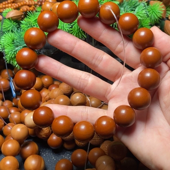 韭***清橄榄核手串1.7手持18颗