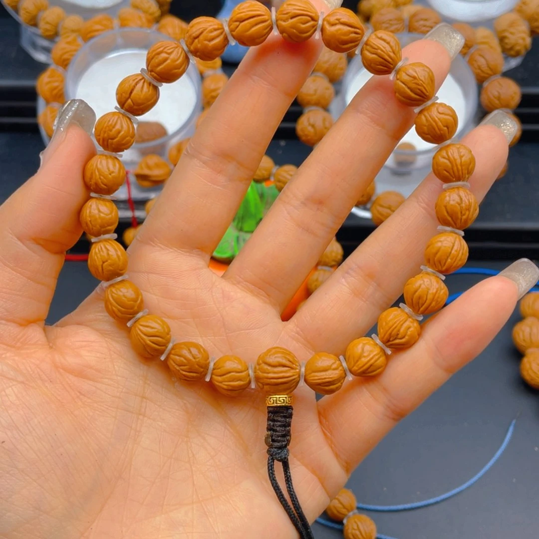 桃核手串到**了见健健康康平平安安5