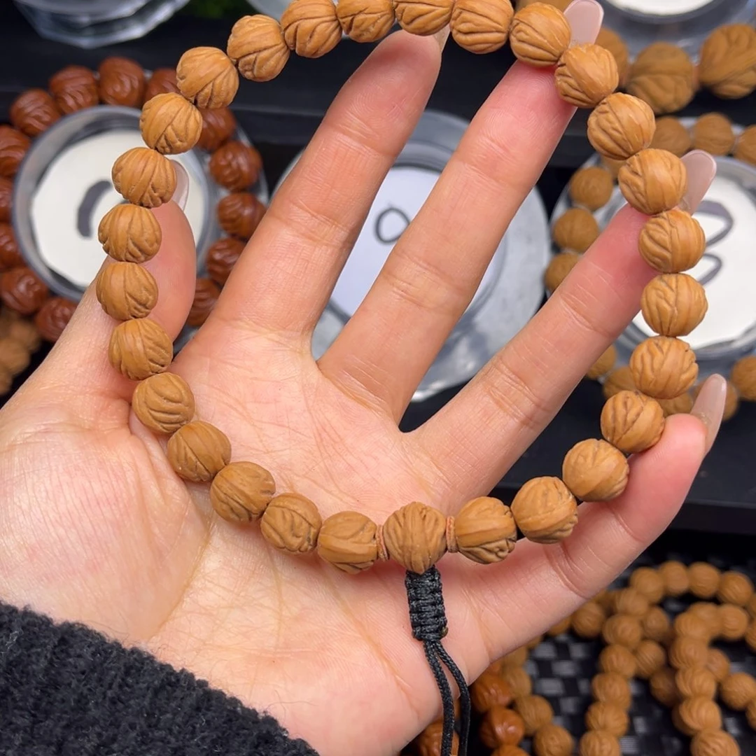 吊坠桃核火焰纹手持