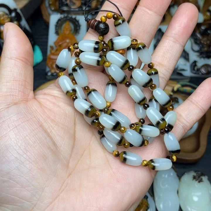 战***）和田玉未镶嵌颈饰