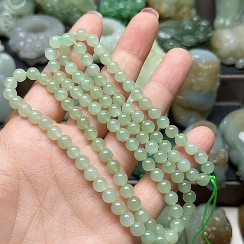 和田玉未镶嵌颈饰龍**人