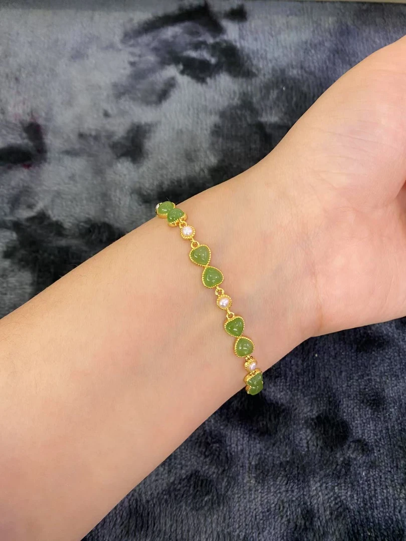 s925银镀金和田玉碧玉蝴蝶结设计款手链