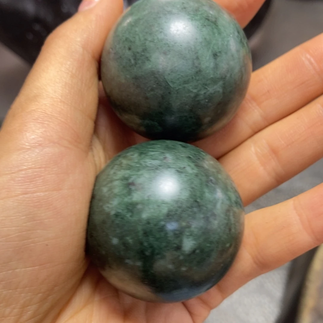 新疆罗碧手把件一对