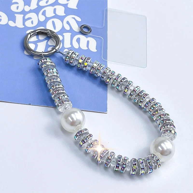 高级感女款苹果手机手腕挂绳挂链串珠轻奢时尚带钻夹片壳手提挂饰