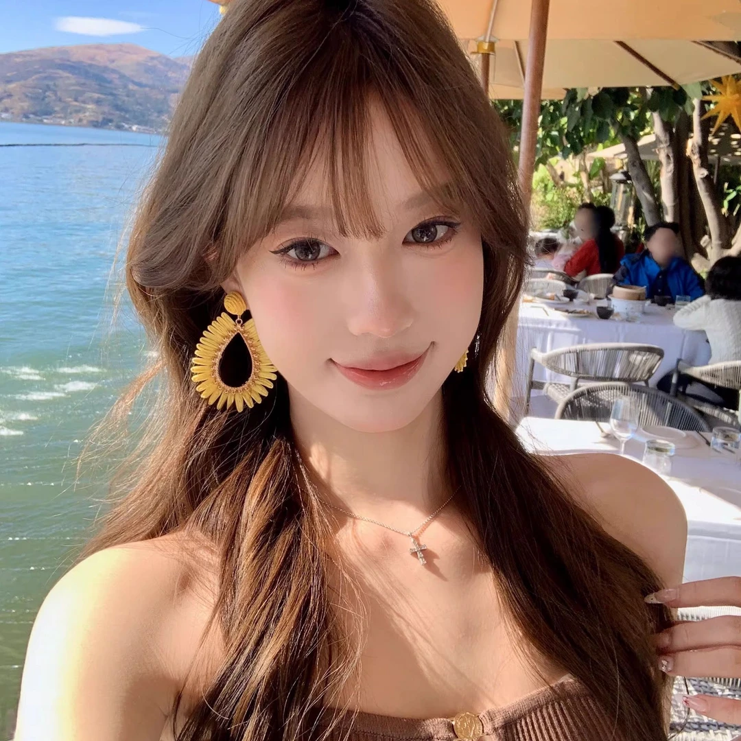 【蜜桃茶】港岛暮色 拉菲草耳环女高级感夸张海边沙滩度假风耳饰