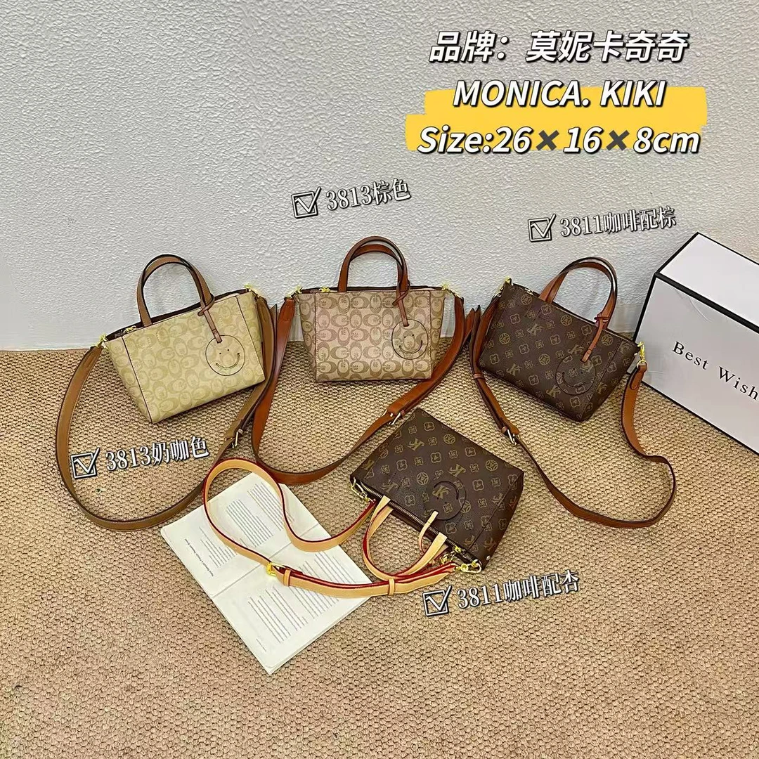 莫妮卡奇奇新款时尚手提单肩斜挎笑脸菜篮子包包