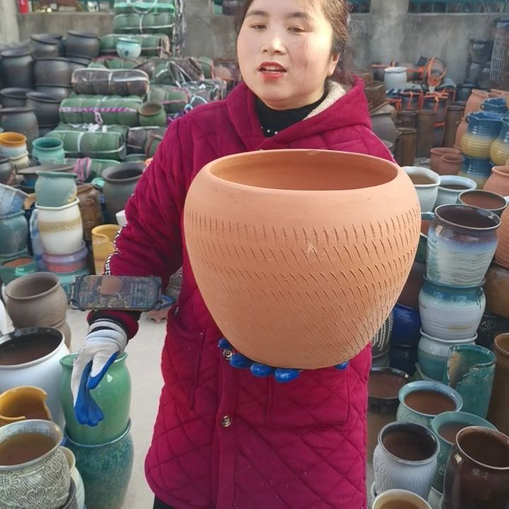 红陶口25高26瑕疵一个盆子