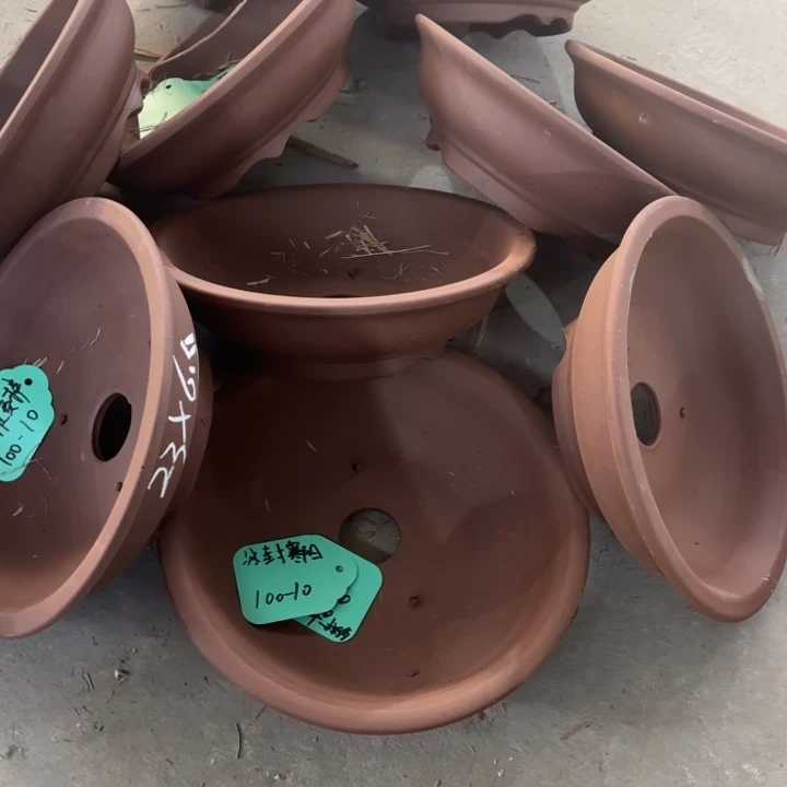 紫砂花盆100-10。
