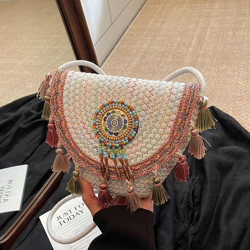 夏季超火小众波西米亚草编包包女2025新款海边沙滩度假编织水桶包