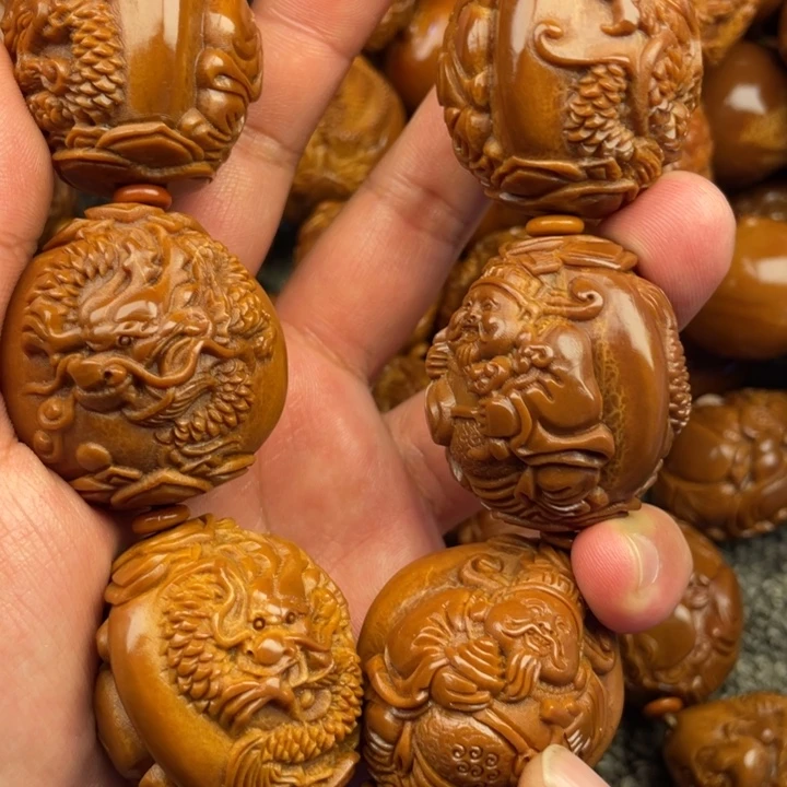 橄榄核吊坠强*橄榄核手持