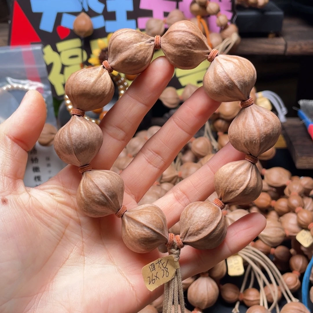 量***.橄榄核吊坠2628四花铁核