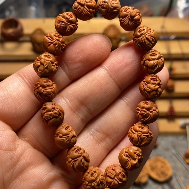 桃核雕刻弥勒手串
