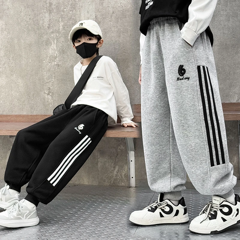 儿童春秋运动休闲裤2025小中大童男女潮流洋气时尚宽松百搭卫裤