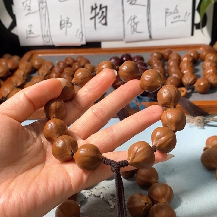 橄榄核手串9171精品蒜头铁核鸡血红12+1颗