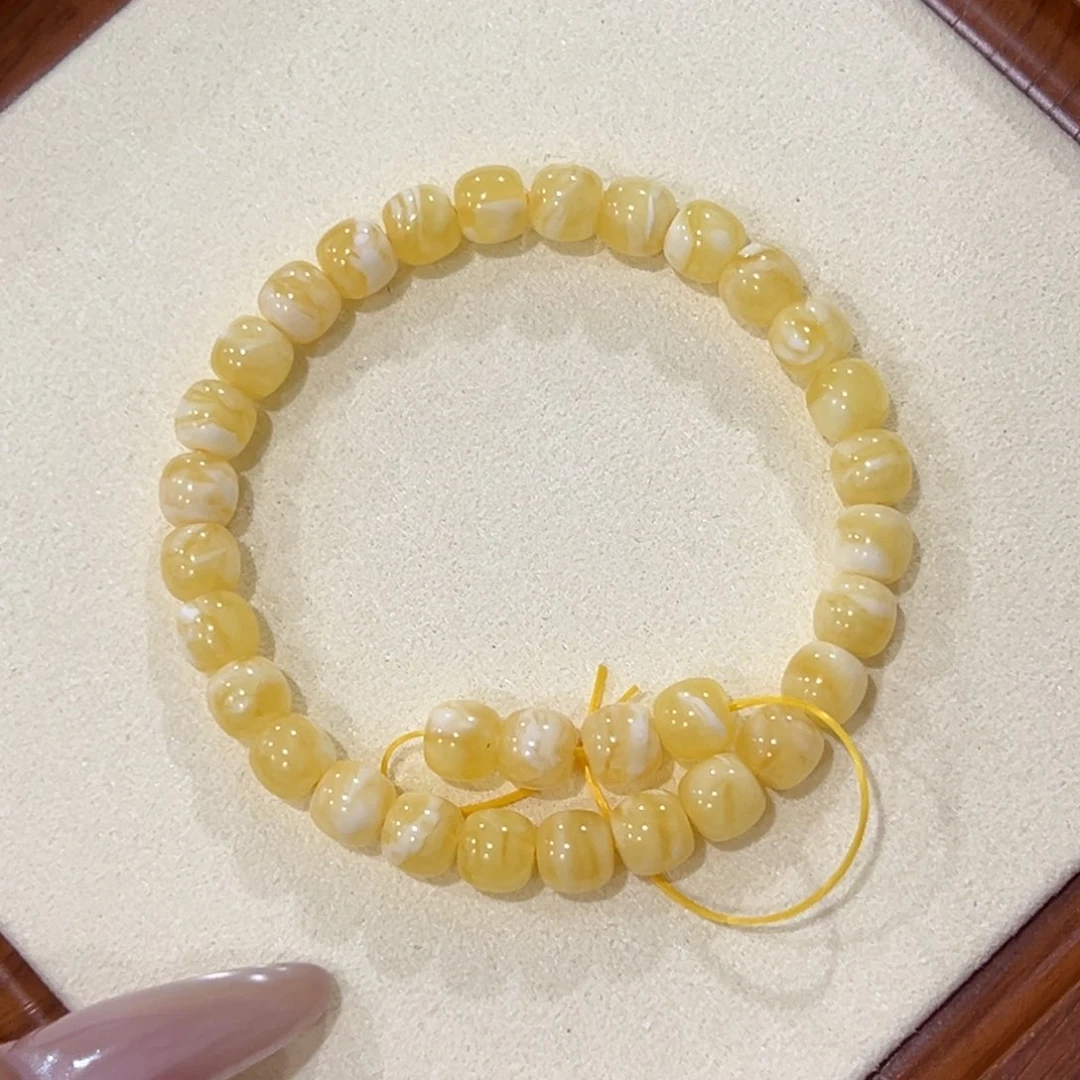 I***G蜜蜡未镶嵌手链6.5m金白妖花手串