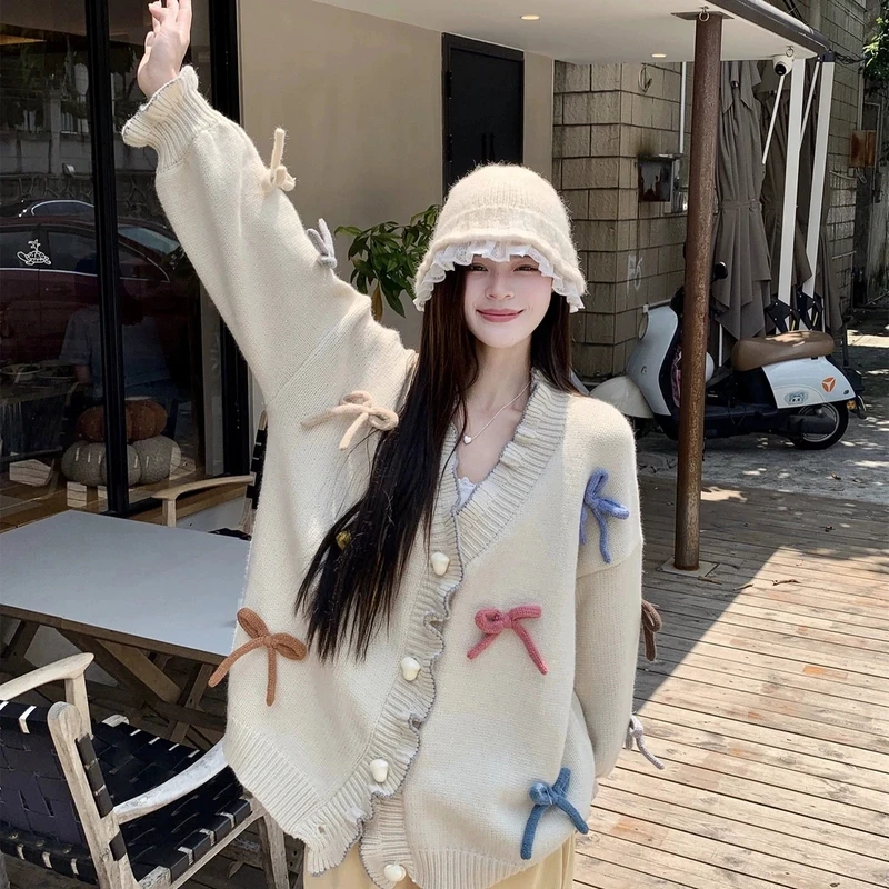 8889设计感甜美减龄重工蝴蝶结毛衣女秋新款慵懒宽松针织外套上衣
