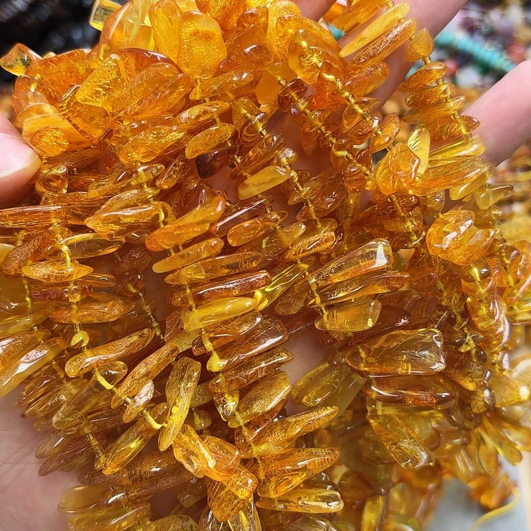 玛瑙/玉髓未镶嵌珠宝半成品琥珀蜜蜡大牙一条
