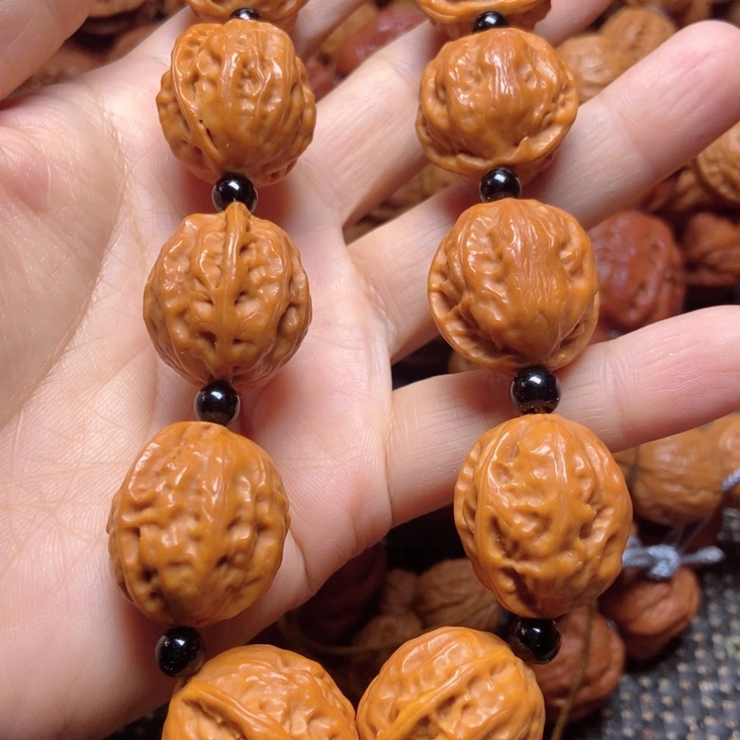 淡***然桃核吊坠官帽手持