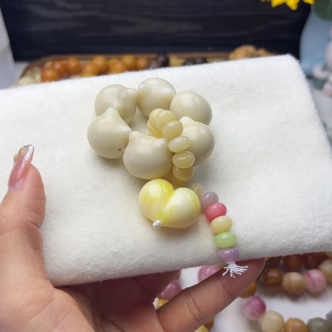 菩提根/象牙果吊坠象牙果猫头手捻通货23mm一串