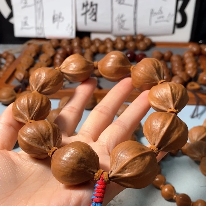 怀***桑手串橄榄核1372精品4花老树王蒜头铁核8+2颗