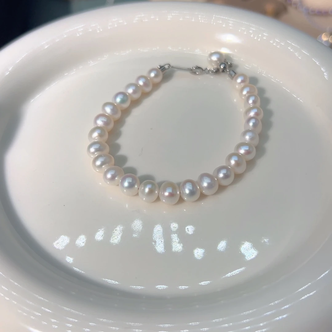 钛钢6到7MM炫彩近圆极光天然珍珠淡水珍珠