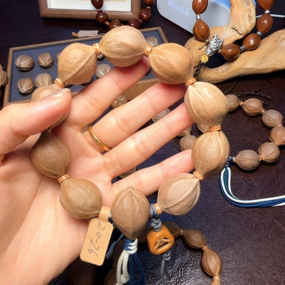 米***偶橄榄核手串梅林铁核20*26
