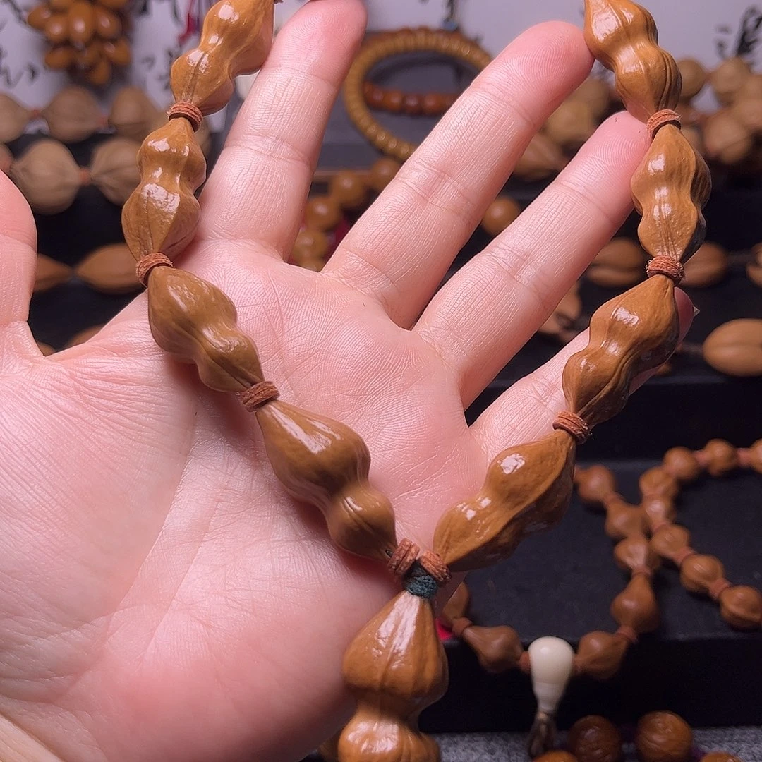 橄榄核吊坠落地生花花生异型14.32