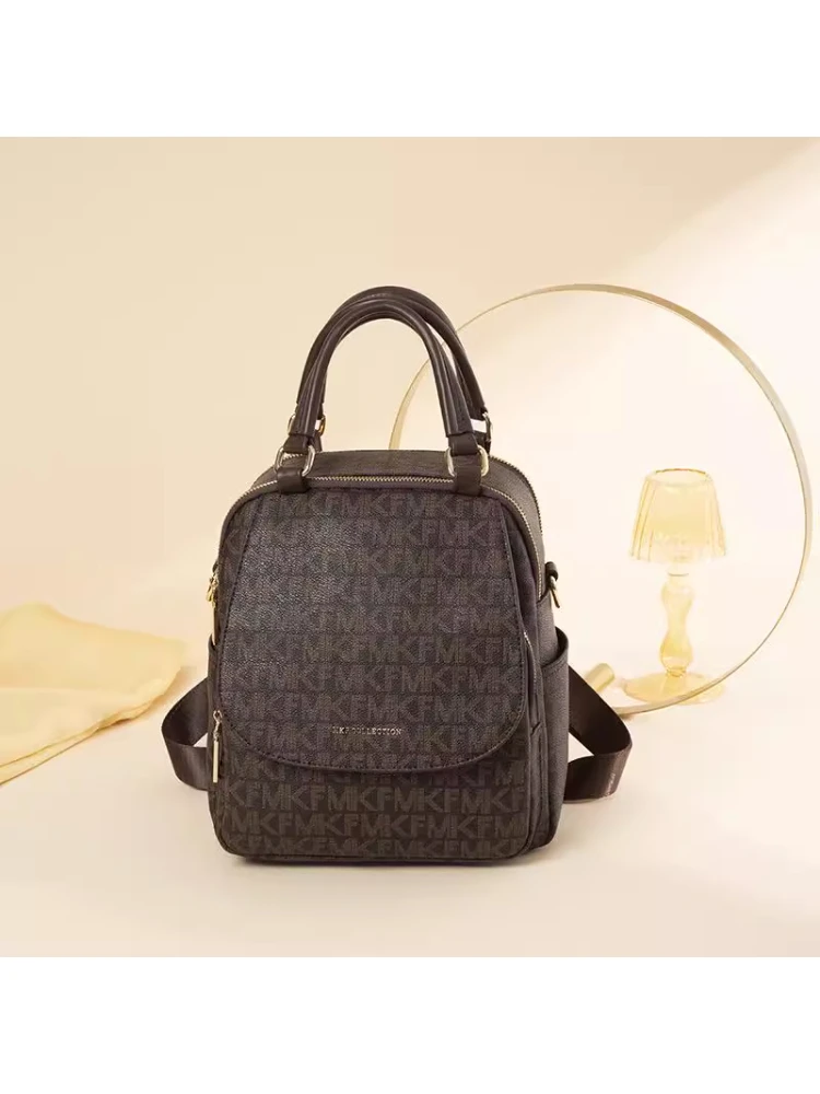 MK F包包女2025新款双肩背包斜跨翻盖包休闲旅游妈咪包防盗大容量