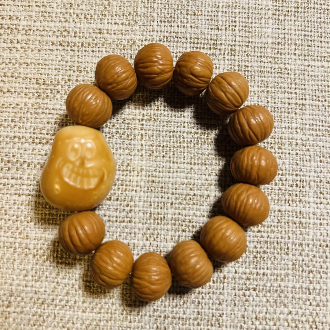 非金属木质手链 9.5-10mm凤羽猴头象牙果之““囧豆“/“肉包”“来財”