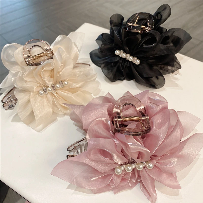 超仙褶皱布艺花朵抓夹女2025新款百搭气质鲨鱼夹后脑勺盘发发夹