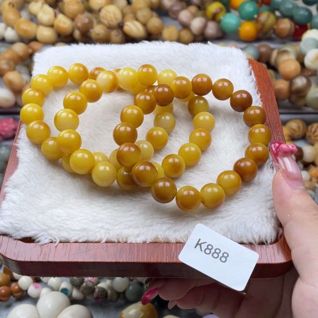 菩提根/象牙果吊坠瑕K888圆珠10mm一串随机