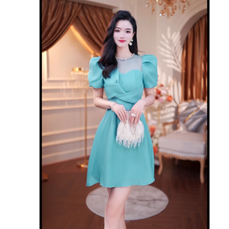 夏季新款气质法式减龄不规则收腰设计感名媛修身短袖连衣裙1661