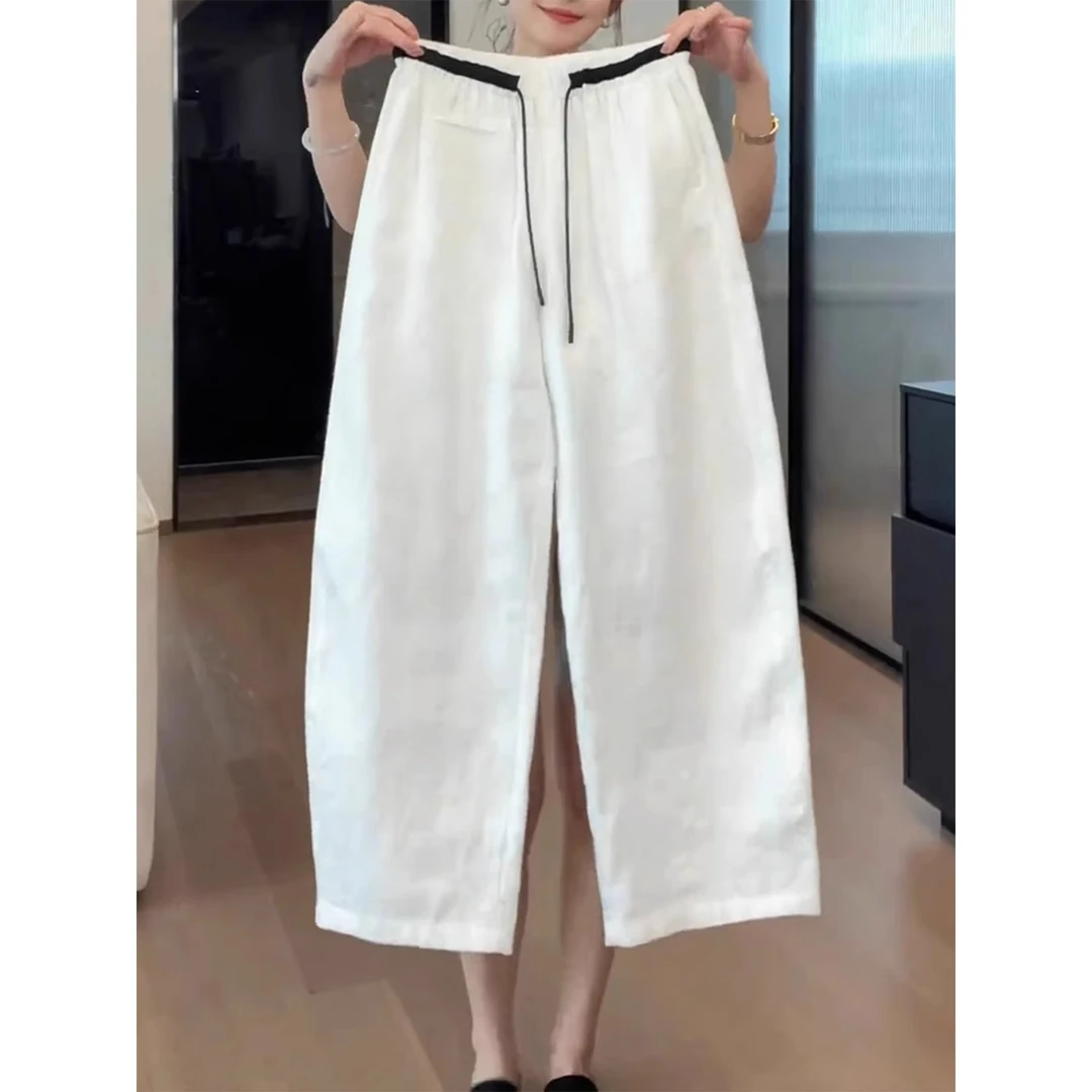 白色亚麻休闲裤女2025年夏季薄款大码梨型身材高腰显瘦九分弯刀裤