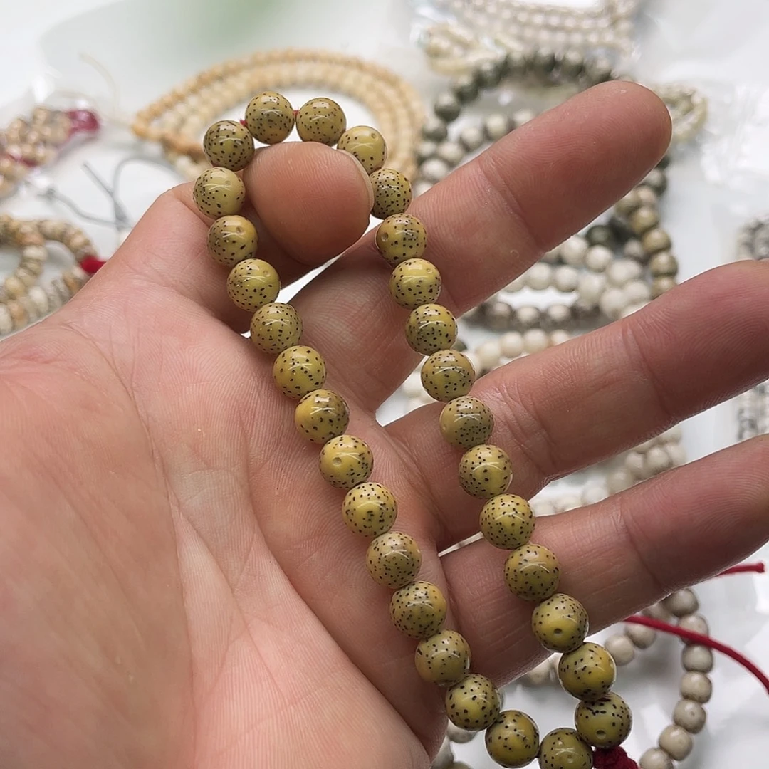 把件星月菩提鸡油黄8圆手持