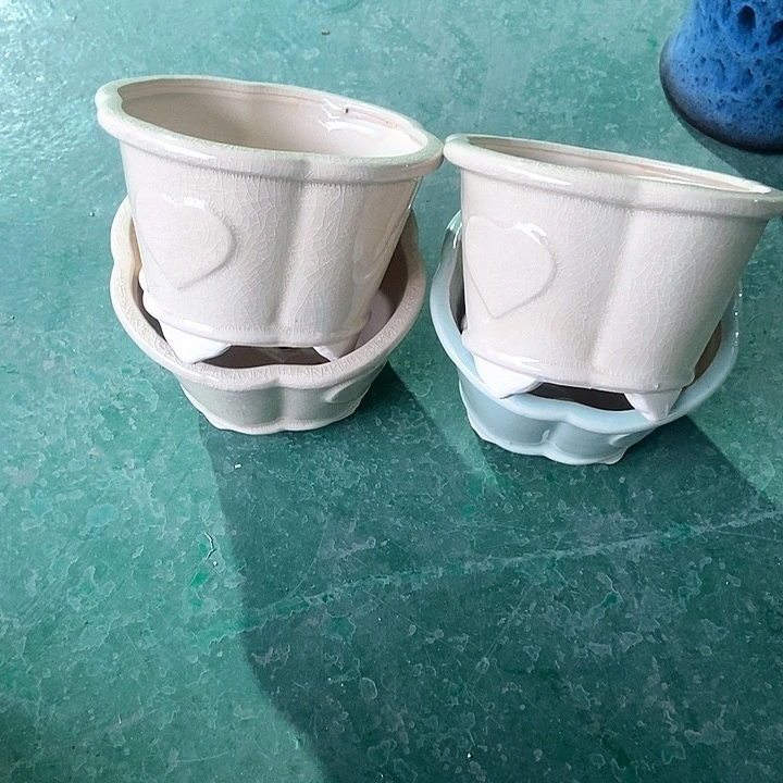 红陶口16。高11。。。