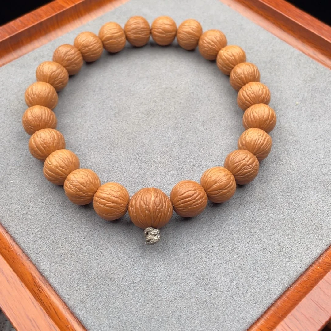 猴头核桃手串凤羽手持