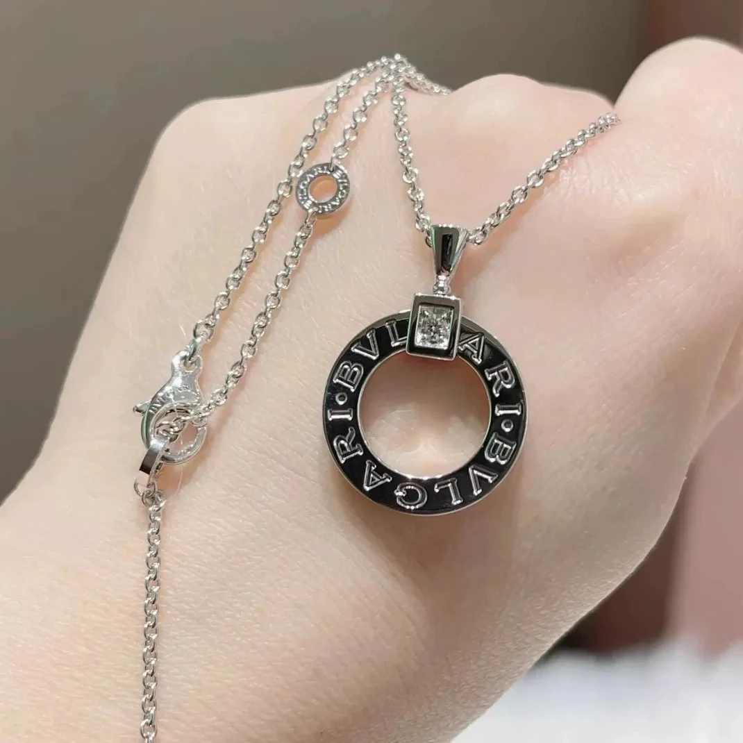 99新 BVLGARI/宝格丽 小花6珊 宝格丽 白金单钻镂空大圆饼 项链