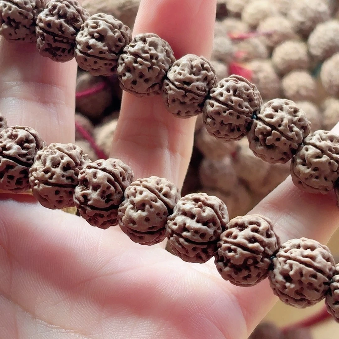 记****印度尼西亚小金刚凹底梅花手持