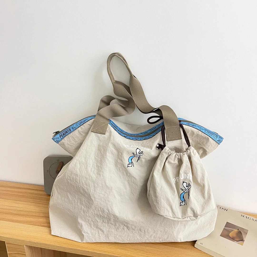 休闲通勤大容量尼龙布包包女2025新款轻便百搭单肩包大学生托特包