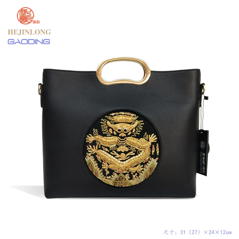 潮绣民族风牛皮手提包