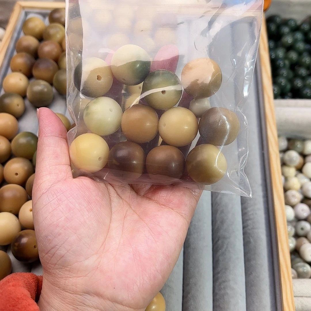 菩提根/象牙果手串王****爪卡22干磨默认微瑕12颗