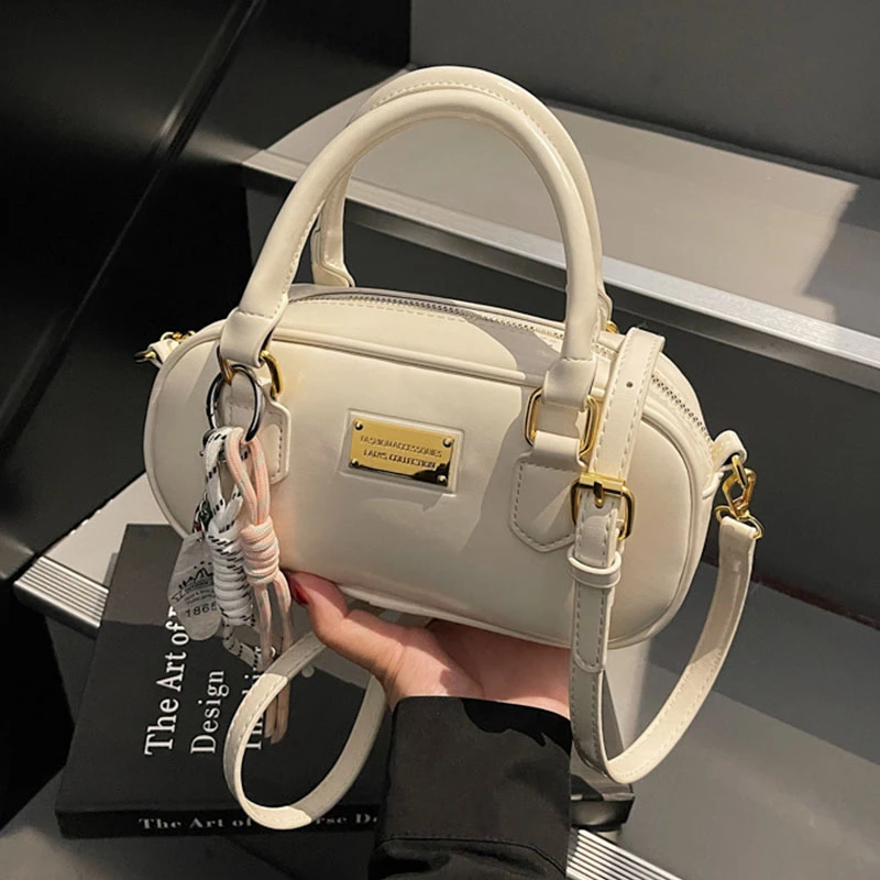 手拎潮流百搭保龄球包2025新款春季小众时尚单肩包通勤休闲斜挎包